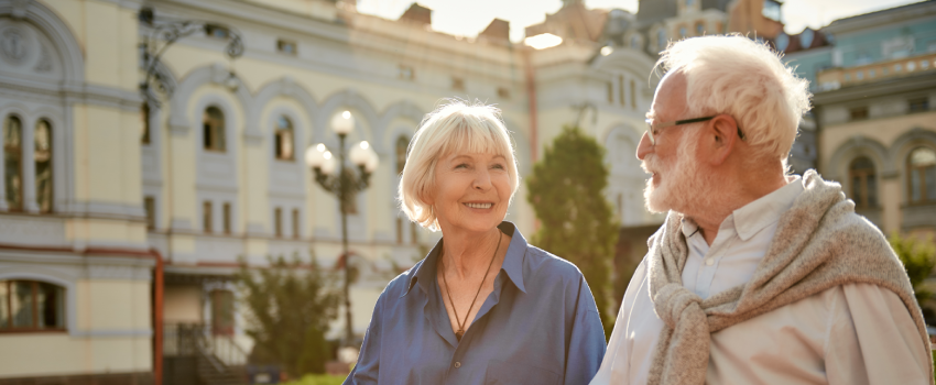 Happy mature couple travelling.