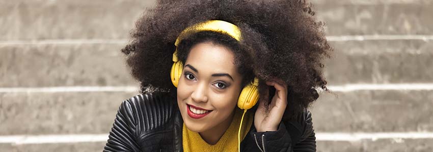 Woman listening to music with her headphones